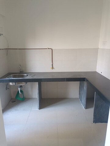Kitchen in 2 BHK Apartment at Ashar Metro Towers, Vartak Nagar – for Sale