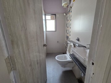 Bathroom in 2 BHK Apartment at Kohinoor Zen Estate, Kharadi – for Rent