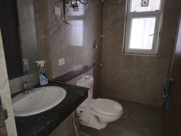 Bathroom in 3 BHK Apartment at Adani M2K Oyster Grande, Sector 102 – for Rent