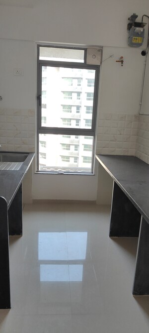 Kitchen in 3 BHK Apartment at Kalpataru Immensa, Kolshet Road – for Rent