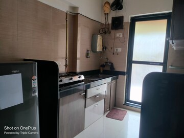 Kitchen in 2 BHK Apartment at Raheja Interface Heights, Malad West – for Rent