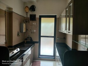 Kitchen in 2 BHK Apartment at Raheja Interface Heights, Malad West – for Rent
