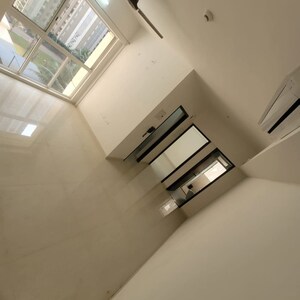 Living Room in 1 BHK Apartment at Lodha Amara, Kolshet Road – for Sale