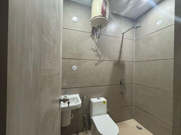 Bathroom in 4 BHK Builder Floor at Sahastradhara Road – for Rent