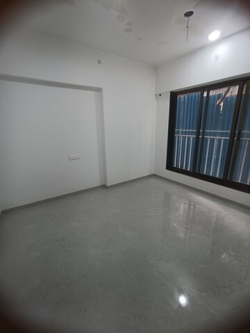 Bedroom in 1 BHK Apartment at Monarch Prathmesh CHS, Malad West – for Sale