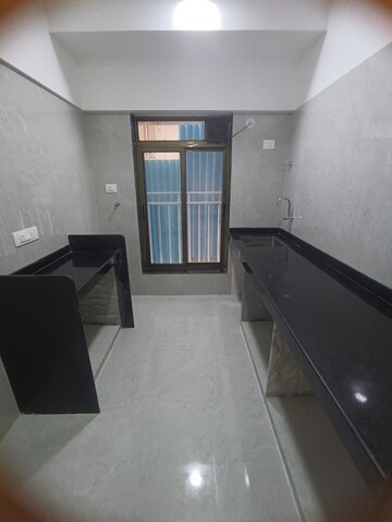 Kitchen in 1 BHK Apartment at Monarch Prathmesh CHS, Malad West – for Sale