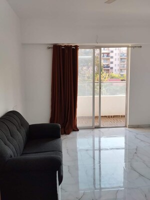 Living Room in 1 BHK Apartment at VTP One, Kharadi – for Rent
