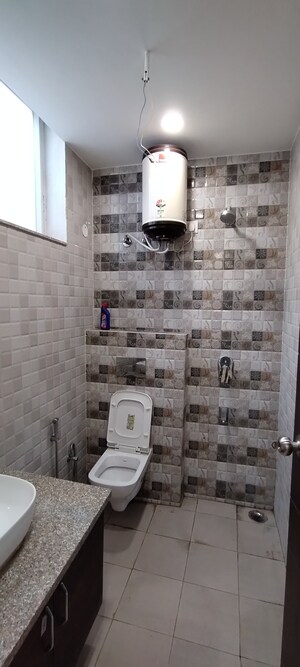 Bathroom in 2 BHK Builder Floor at Sahastradhara Road – for Sale