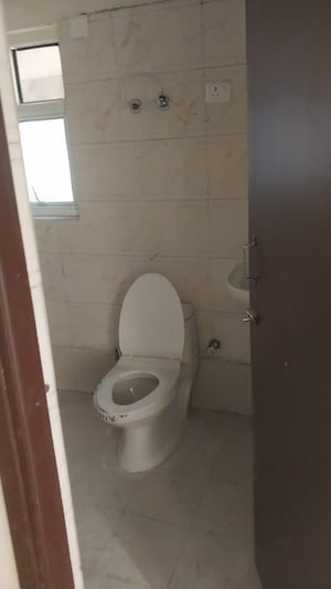 Bathroom in 2.5 BHK Apartment at Eureka Diya Green City, Raj Nagar Extension – for Sale