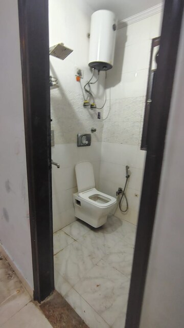 Bathroom in 3 BHK Builder Floor at Dwarka Mor – for Rent