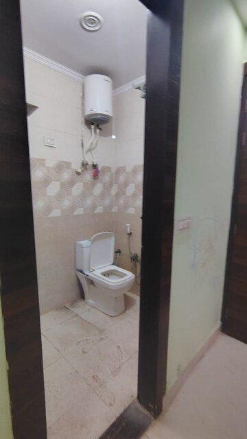Bathroom in 3 BHK Builder Floor at Dwarka Mor – for Rent