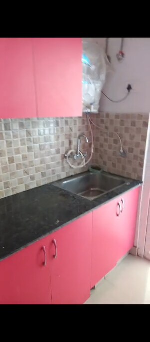 Kitchen in 2 BHK Apartment at Amaatra Homes, Sector 10 Greater Noida – for Sale