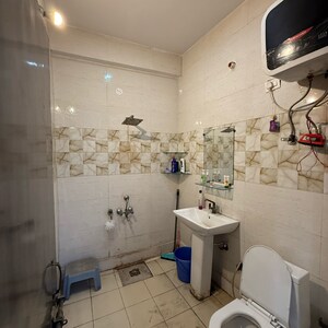Bathroom in 1.5 BHK Builder Floor at Sector 63a – for Rent
