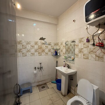 Bathroom in 1.5 BHK Builder Floor at Sector 63a – for Rent