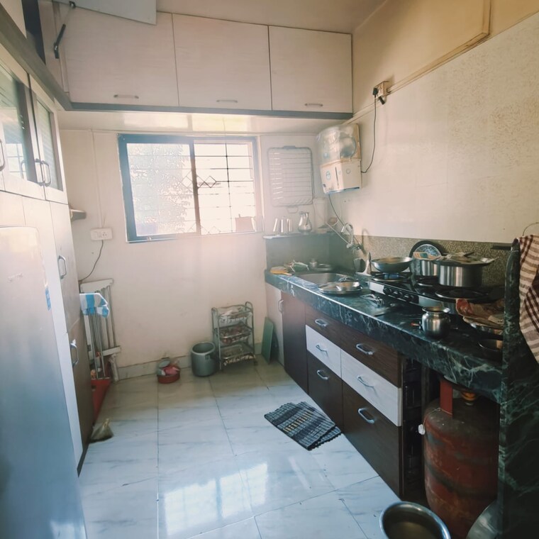 Kitchen, vitthal-sangam 1 Bedroom 615 Sq.Ft. Apartment In Sarita Vihar Pune 9413014
