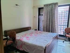 Bedroom in 2 BHK Apartment at K Raheja Heights, Malad East – for Rent