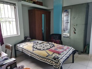 Bedroom in 2 BHK Apartment at Karan Gharonda, Wadgaon Sheri – for Rent