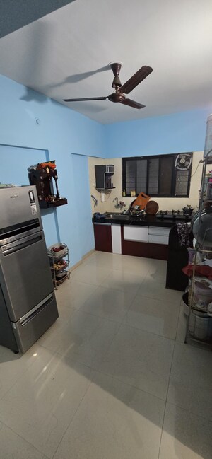 Kitchen in 2 BHK Apartment at Sonigara Vihar Wing C, Kalewadi – for Rent