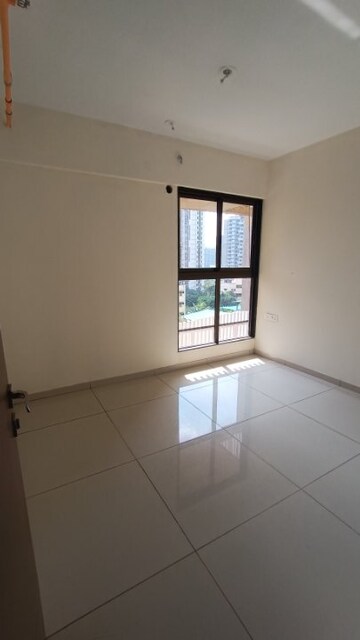 Bedroom in 2 BHK Apartment at Chandak 34 Park Estate, Goregaon West – for Rent