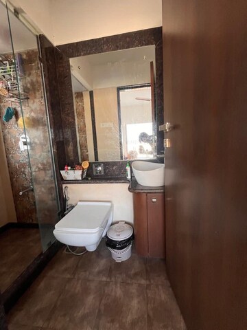 Bathroom in 1 BHK Apartment at Andheri CHS, Andheri West – for Rent