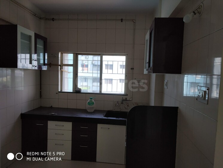Kitchen, kumar-primavera 2 Bedroom 823 Sq.Ft. Apartment In Wadgaon Sheri Pune 9413222