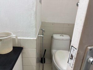 Bathroom in 3 BHK Apartment at DLF Exclusive Floors Owners Society, Sector 53 – for Rent