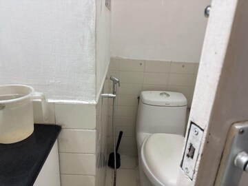 Bathroom in 3 BHK Apartment at DLF Exclusive Floors Owners Society, Sector 53 – for Rent