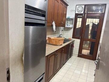 Kitchen in 3 BHK Apartment at DLF Exclusive Floors Owners Society, Sector 53 – for Rent
