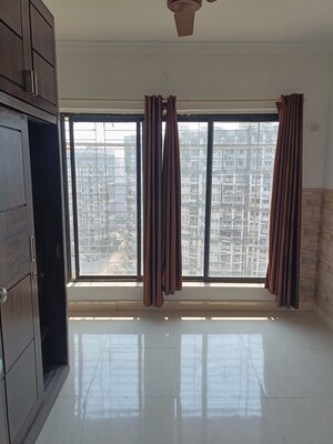 Room in 2 BHK Apartment at Royal Palms, Goregaon East – for Rent