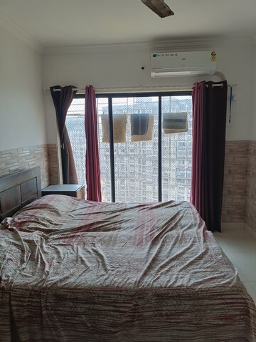 Bedroom in 2 BHK Apartment at Royal Palms, Goregaon East – for Rent