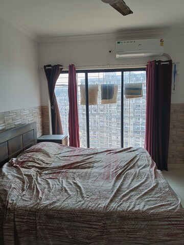 Bedroom in 2 BHK Apartment at Royal Palms, Goregaon East – for Rent