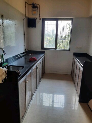 Kitchen in 2 BHK Apartment at Ambika Residency Malad West, Malad West – for Rent