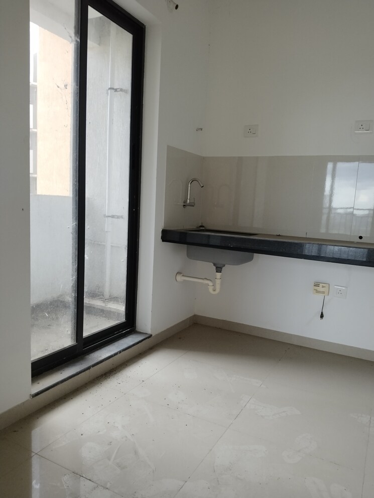 Kitchen, shapoorji-pallonji-joyville-hinjewadi 2 Bedroom 592 Sq.Ft. Apartment In Hinjewadi Pune 9413380