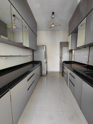 Kitchen in 2 BHK Apartment at Rustomjee OZone, Goregaon West – for Rent