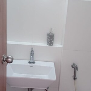 Bathroom in 3 BHK Apartment at Godrej Emerald, Gaimukh Gaon – for Rent