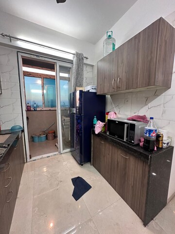 Kitchen in 2 BHK Apartment at LMS Finswell Woods, Viman Nagar – for Rent