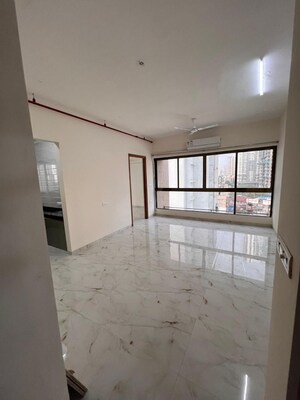 Room in 2 BHK Apartment at Ruparel Ariana, Parel – for Rent