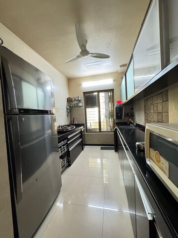 Kitchen in 3 BHK Apartment at Oberoi Realty Woods, Goregaon East – for Rent