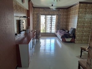 Living Room in 1 BHK Apartment at Raunak Bliss, Ghodbunder Road – for Sale