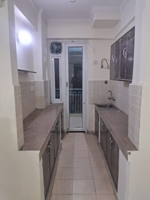 Kitchen in 2 BHK Apartment at Umang Winter Hills, Sector 77 – for Rent