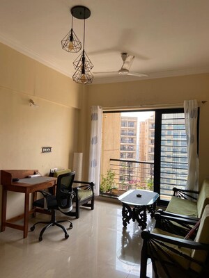 Living Room in 1 BHK Apartment at K Raheja Raheja Residency, Malad East – for Rent