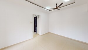 Room in 2 BHK Apartment at Rashi Tower, Goregaon East – for Sale