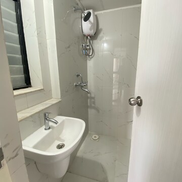 Bathroom in 1 BHK Apartment at Runwal Gardens Phase 3, Kalyan Shilphata Road – for Rent