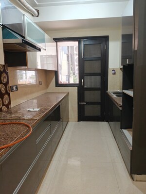 Kitchen in 3 BHK Apartment at Ansal API Esencia, Sector 67 – for Rent