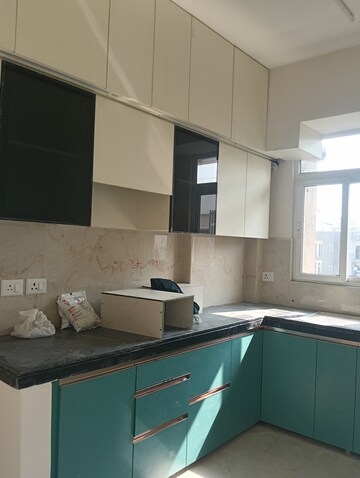 Kitchen in 2.5 BHK Apartment at Smart World Gems, Sector 89 – for Rent