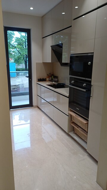Kitchen in 3 BHK Apartment at Oro Constella, Sushant Golf City – for Sale