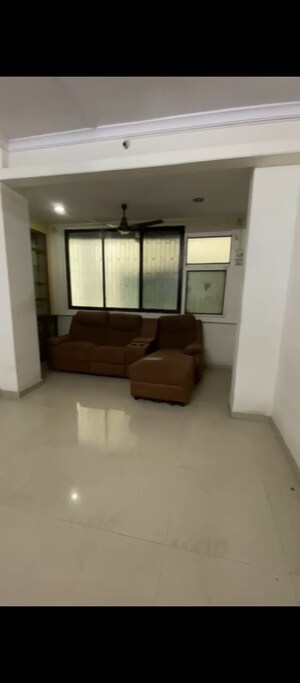 Living Room in 1 BHK Apartment at Lodha Prime Square, Dombivli East – for Rent