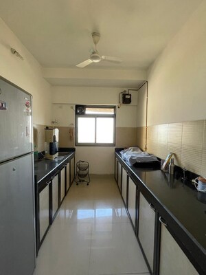 Kitchen in 3 BHK Apartment at Lodha Splendora, Ghodbunder Road – for Rent