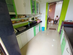 Kitchen in 2 BHK Apartment at Raunak Laxmi Narayan Residency, Pokhran Road No Two – for Sale