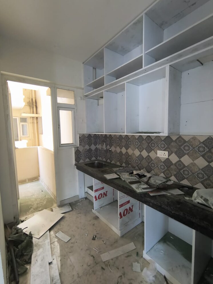 Kitchen, signature-the-millennia-2 2 Bedroom 625 Sq.Ft. Apartment In Sector 37d Gurgaon 9417746